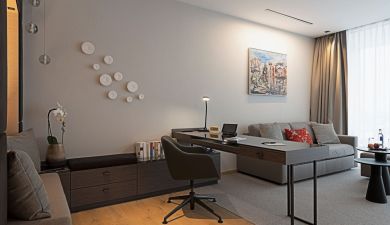 living area with a desk and a couch